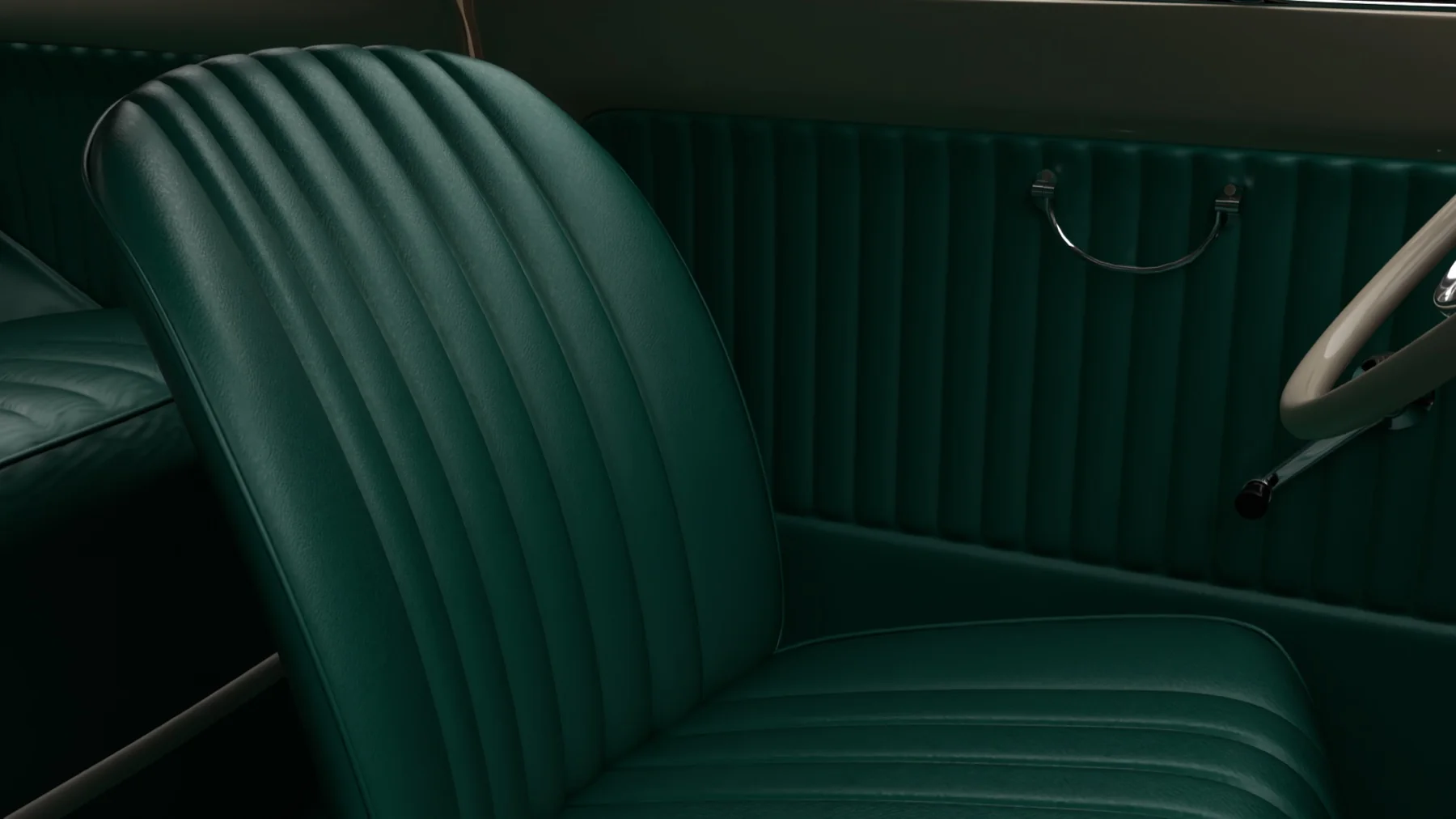 Close detail of deep green ribbed leather seat and door upholstery.